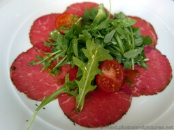 Beef Carpaccio with Basil Oil & Arugula.jpg