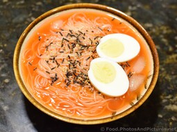Spicy Cold Korean Noodle Soup with Seaweed & Sliced Boiled Egg.jpg