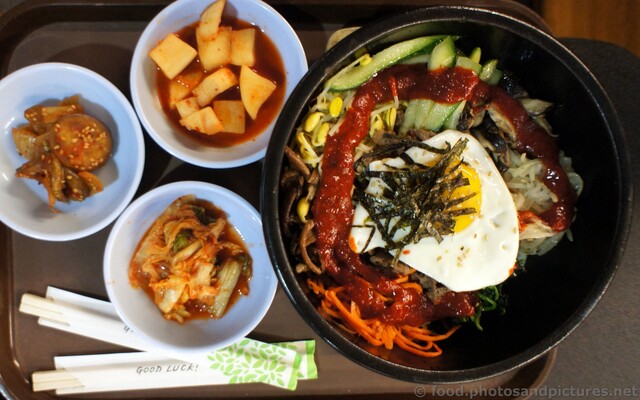 Bibimbap Rice with Egg, Beef and Vegetables with Chopsticks.jpg