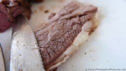 Knife on Top of Fatty BBQ Brisket Beef.jpg